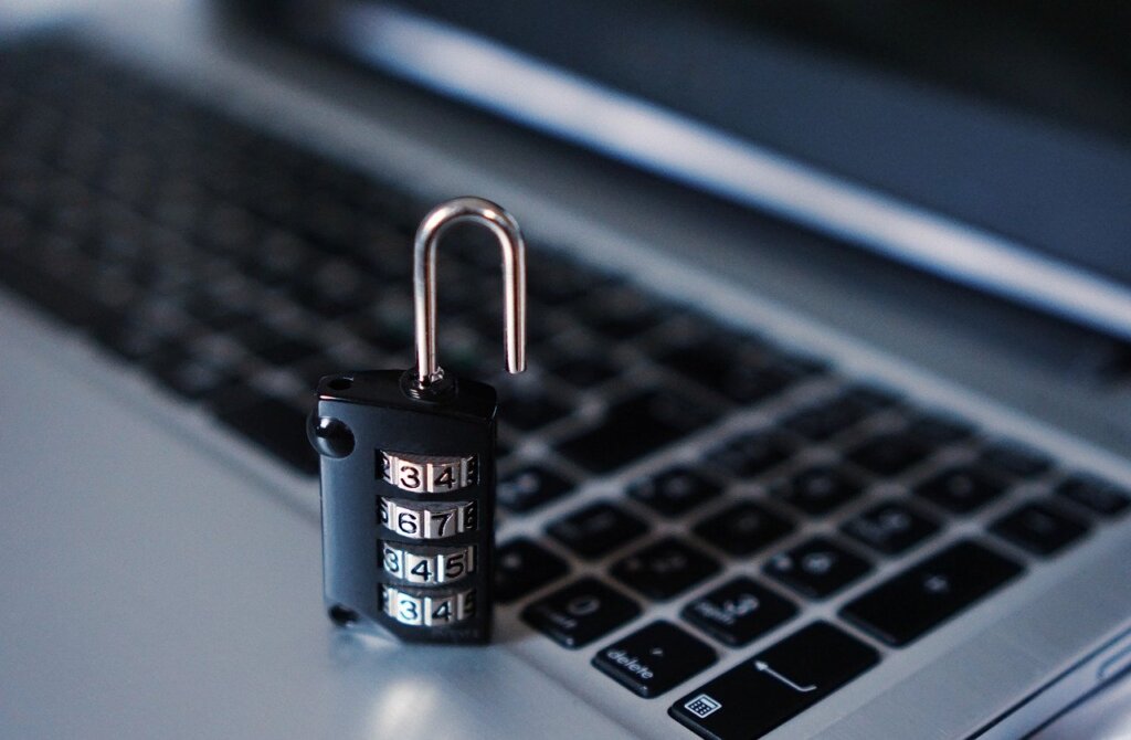 numbered lock kept against a keyboard representing importance of data security